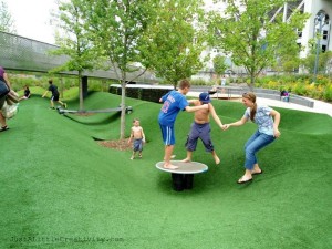 playground with artificial turf field